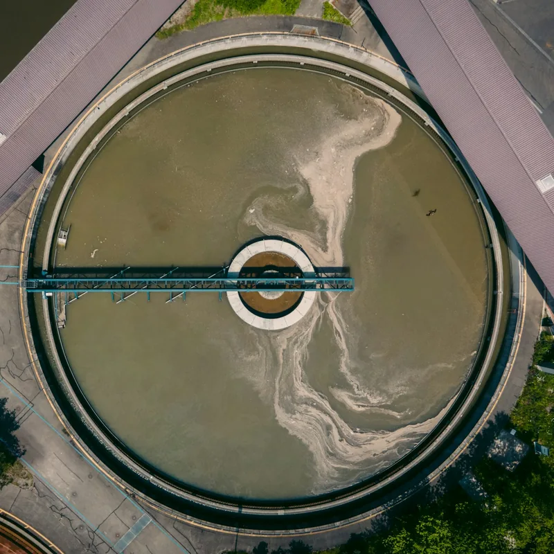 Aerial view of a round clarifier basin