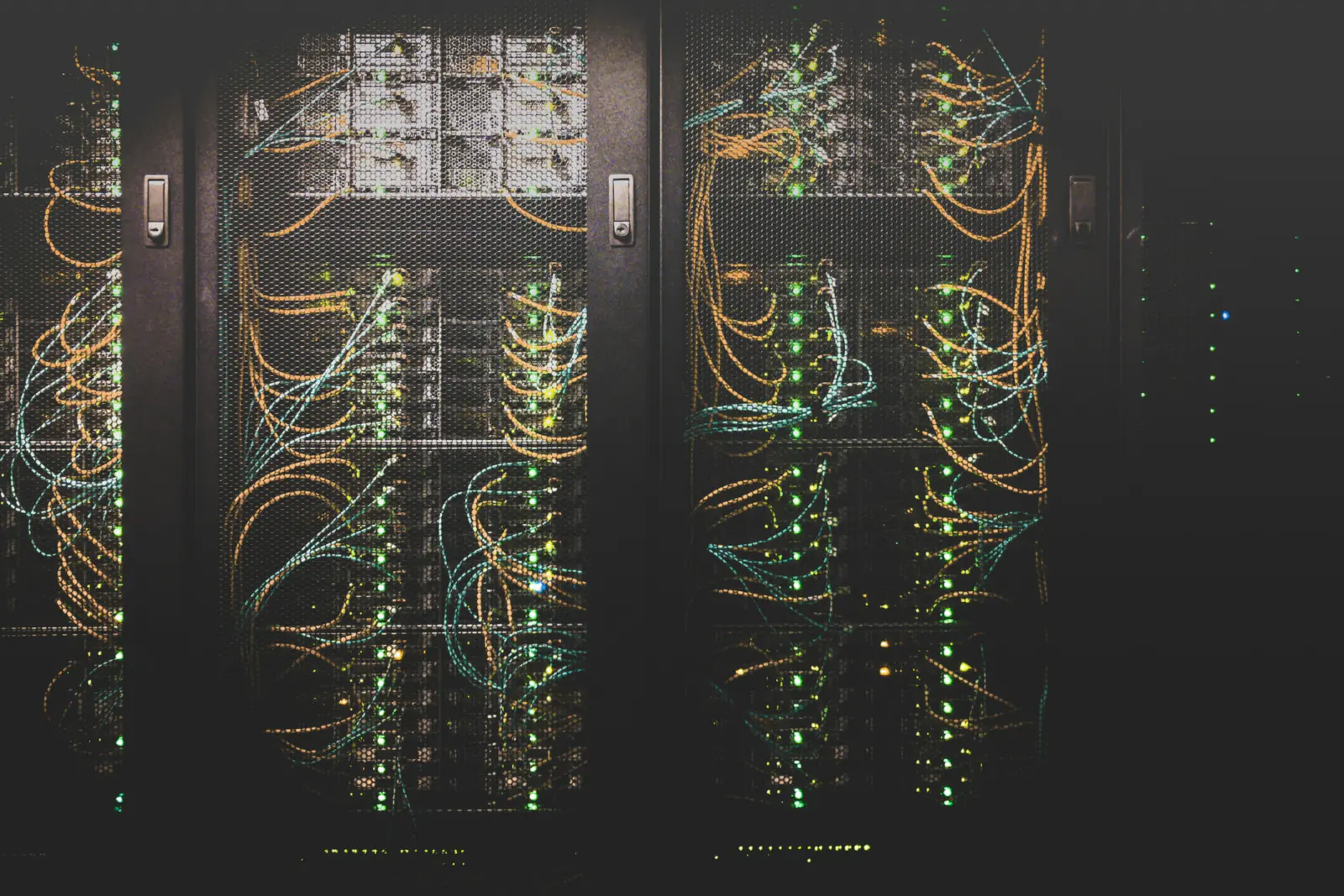 Server racks with network cabling in a data center